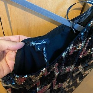 Mini sequined dress.